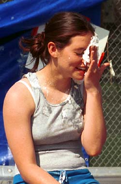 Pi Phi Jayme Lawson gets a pie in the face at Thurtene Carnival