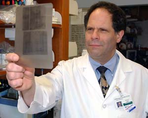 Phillip Tarr reviews a radiograph