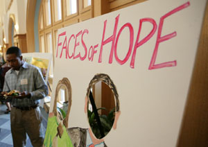 A poster session in the Whitaker Hall Atrium shows the many ways members of the WUSTL community are involved in the community at large.