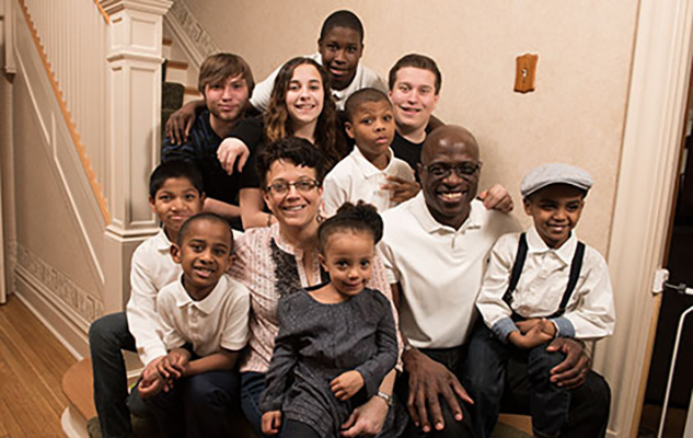 Melissa Hopkins and most of her family at their home in Belleville, Ill. She and her husband, Rod, have three children with plans to adopt three more. She also shares custody of three children and has three grown sons. Photo: Tim Parker