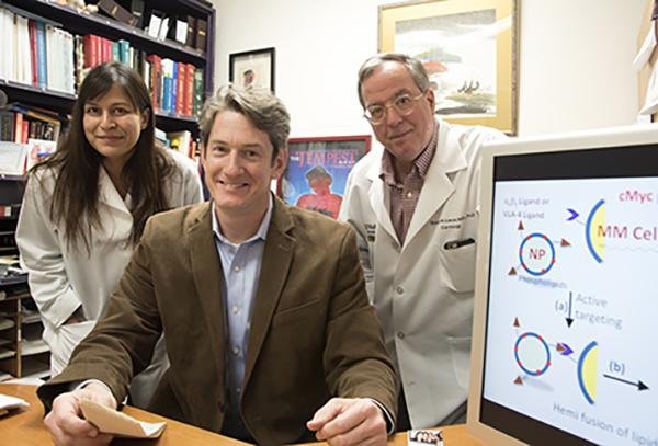 Researchers at Washington University School of Medicine in St. Louis have developed a nanotherapy that is effective in treating mice with multiple myeloma, a cancer of bone marrow immune cells. From left are first author Deepti Sood Gupta, PhD, and co-senior authors Michael H. Tomasson, MD, and Gregory M. Lanza, MD, PhD. Photo: Robert Boston