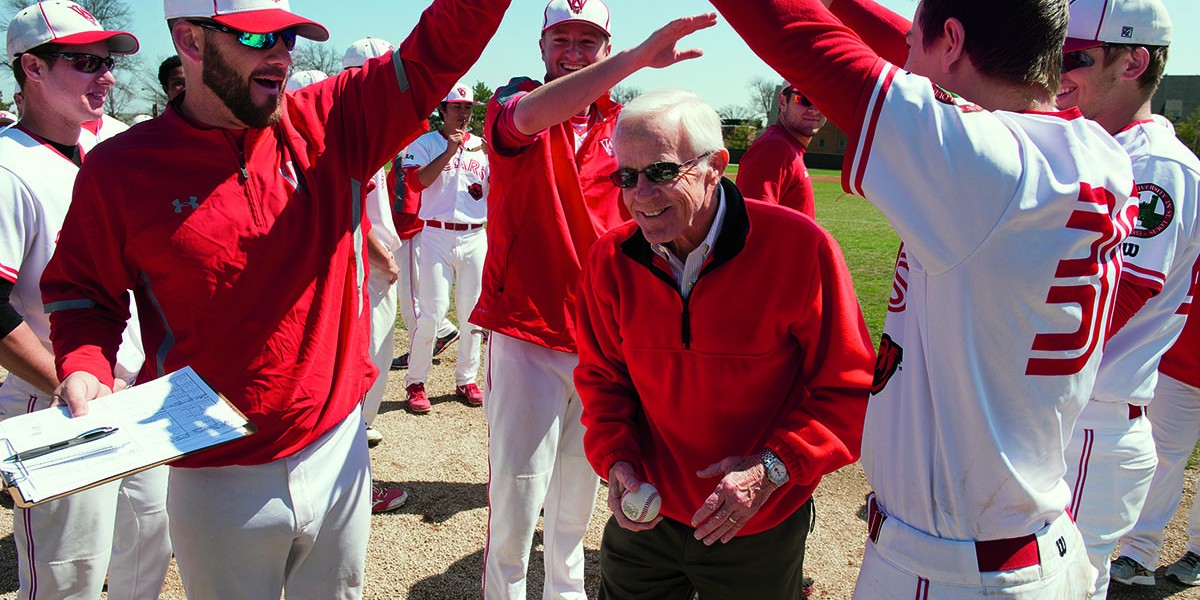 John Schael, retired athletics director, being honored at baseball game.