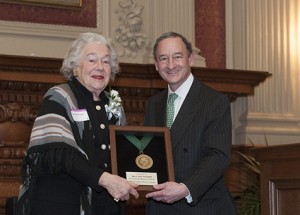 Mary Dell Olin Pritzlaff and Chancellor Mark S. Wrighton attend a Spencer T. Olin professorship installation in Holmes Lounge in 2012.  