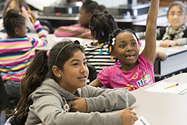 One school, 16 languages: How Washington University helped boost scores at St. Louis’ most diverse school​​​