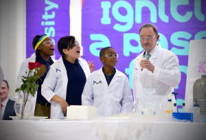 Chancellor Wrighton conducts a chemistry experiment for the students of KIPP Inspire Academy, one of four charter schools sponsored by Washington University. James Byard/WUSTL Photos