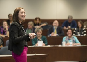 woman speaks to class