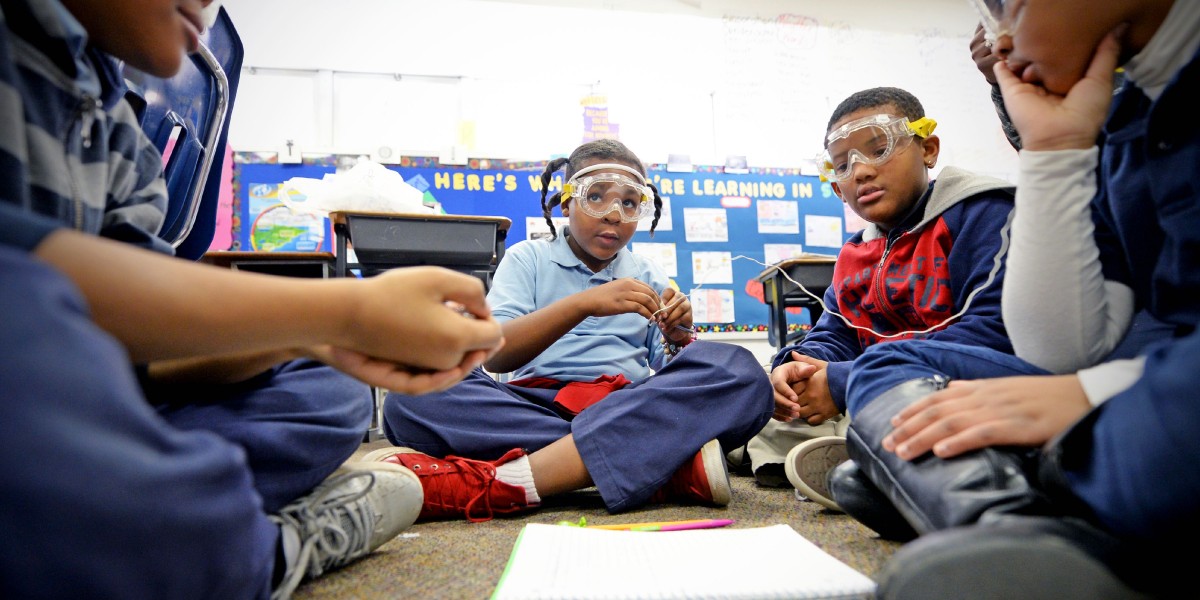 Fourth graders doing a science experiment