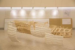 Prototype watercraft hanging from wires