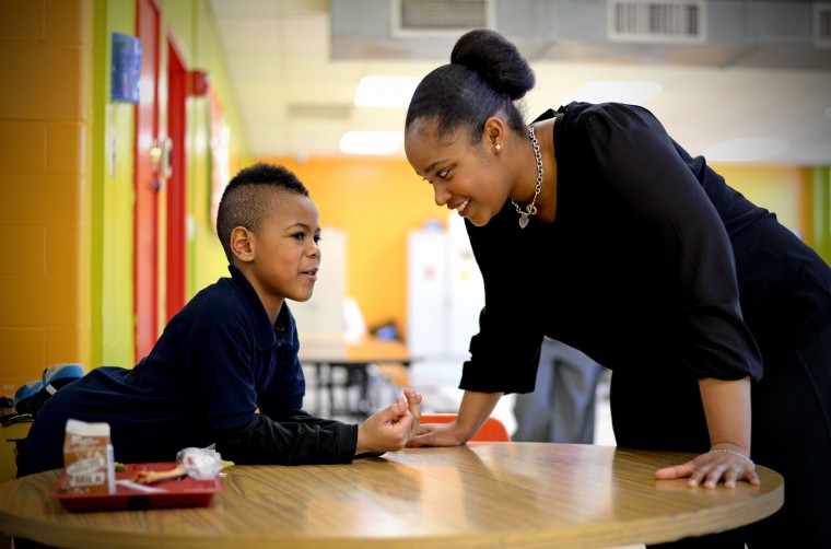 Keyria Jeffries talks to a student