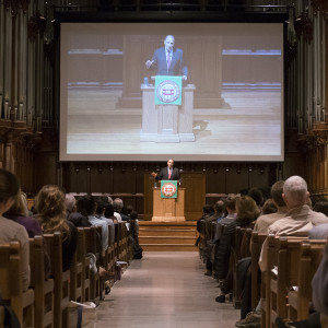 man speaks in chapel