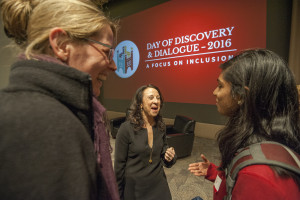 three people chatting