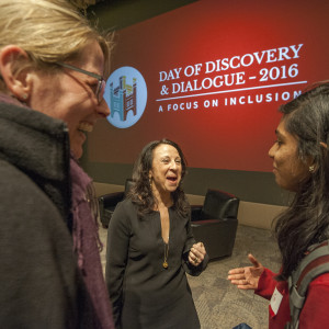 three people chatting