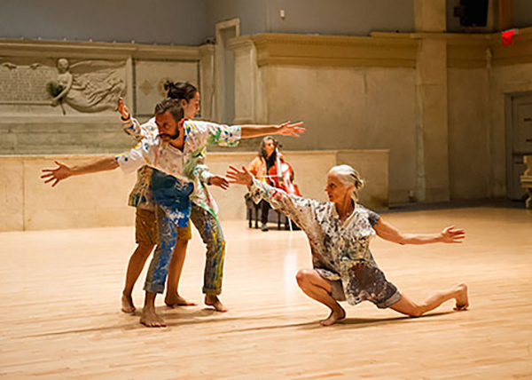 Three dancers performing