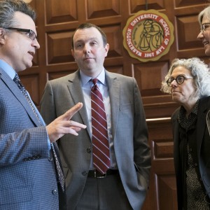 people talk in Law School's Moot Courtroom