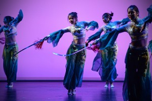 performers dance with swords