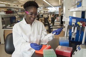 A student in the lab of 4515 McKinley Research Buidling.