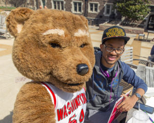 Wash U Bear meets a student