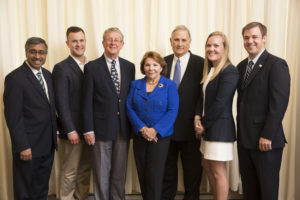 (From left:) Mahendra Gupta; Christopher Hoffmann, MBA '16, vice president of Olin Family Business Club; Roger Koch; Elke Koch; Paul Koch; Emmy Caton, MBA '17 and incoming club president; and Ryan Plotkin, MBA '16 and president. (Photo: Whitney Curtis/Washington University)