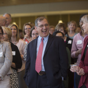 people laugh during a reception