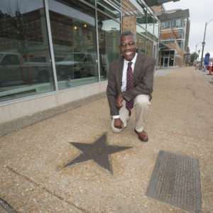 Gerald Early with his star on the walk of fame in the UCity Loop