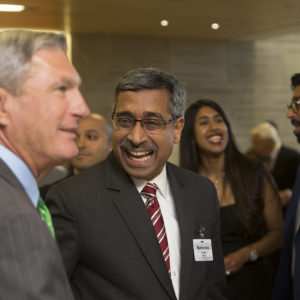 men laughing at reception