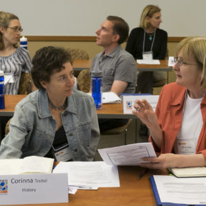 people talk during a classroom discussion