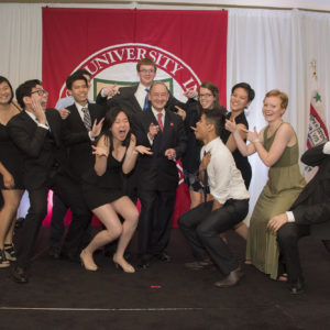 students and chancellor take a fun photo