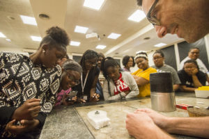 Erik Henriksen, assistant professor of physics in Arts & Sciences, instructs the class. (Photo: Joe Angeles/Washington University)