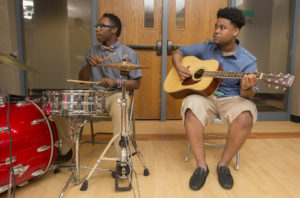 students play instruments