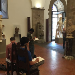 students draw sculptures in Florence