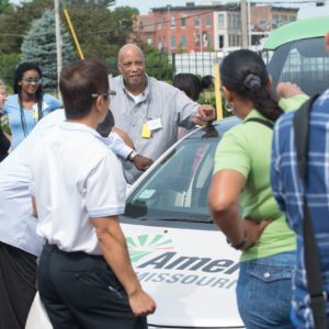 teachers talk around an Ameren vehicle