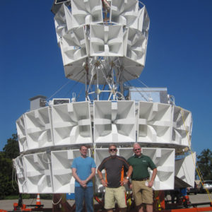 men stand in front of ANITA IV