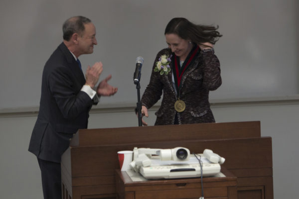 Elfenbein installed as John K. and Ellen A. Wallace Distinguished Professor