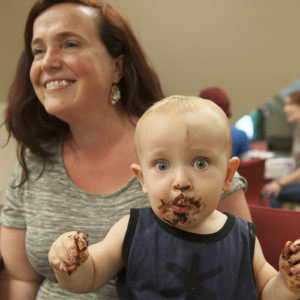 a messy kid eating