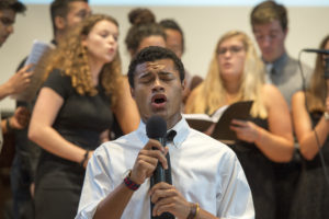 student sings