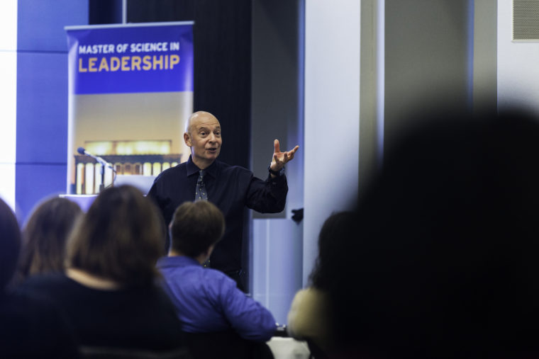 The Olin Business School at Washington University, in partnership with the Brookings Institution, has designed the MS-Leadership degree to develop leaders for service as senior federal executives. Here, Andrew Shatte, founder and president of Phoenix Life Academy, teaches resilience. (Photo: Tamzin B. Smith/Brookings Executive Education)