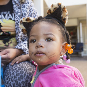 little girl with cat ears