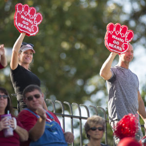 parents cheer for football game