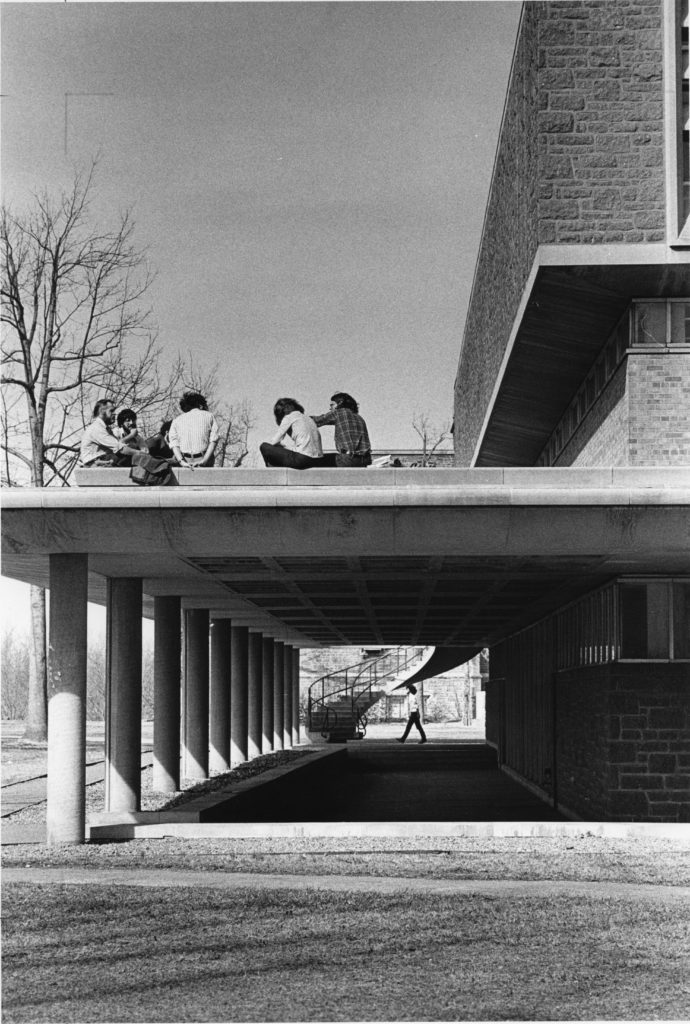 Before Whispers and other renovations, Olin Library had an overhang, that was covered in small stones. It was known to students as "The Olin Beach." Stairs led up to the overhang where students would go to have lunch or lay in the sun. When Whispers was being built, students lamented that the construction was “taking away our beach.” 