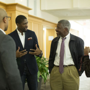 men chat during AFAS celebration