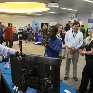 people chat at business competition