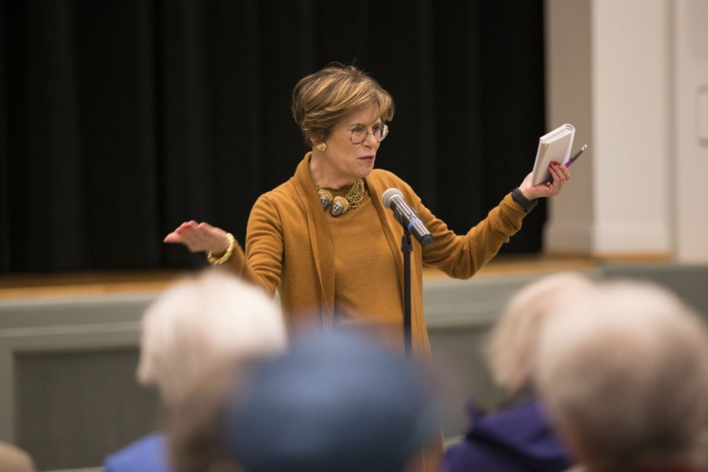 Lynn Hamilton, founder of Maturity and Its Muse, greets the audience. Hamilton organized the concert with Christine Armistead and Jennifer Gartley in the Department of Music in Arts & Sciences. (Photo: Whitney Curtis/Washington University)