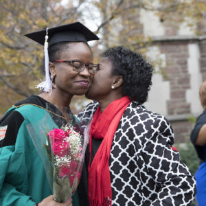 student celebrates with mother