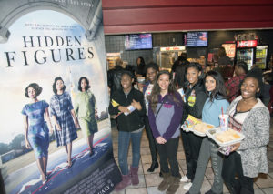 students outside movie theater