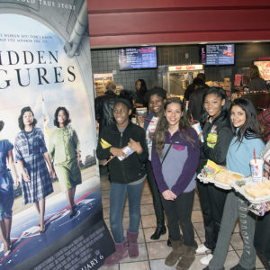 students outside movie theater