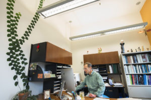 biologist's plant grows up the wall
