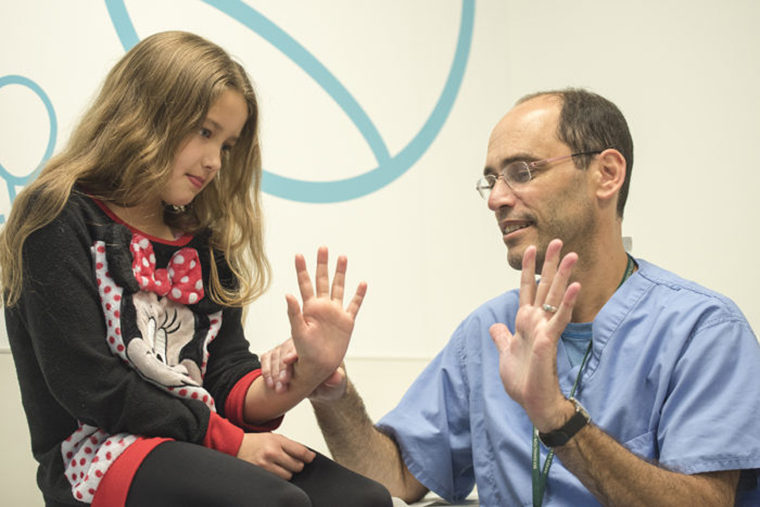 Charles Goldfarb with young patient