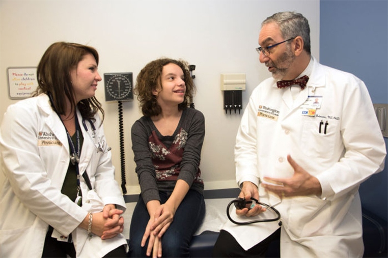 David Gutmann speaks with a patient