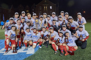 women's soccer team celebrates