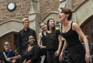 students sing